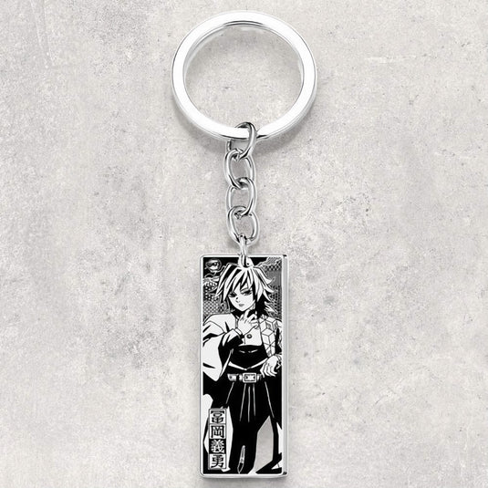 Porte-Clés Giyu Tomioka - Incarnez la détermination du pilier de l'eau avec ce porte-clés en acier inoxydable, une pièce emblématique pour les fans de Demon Slayer