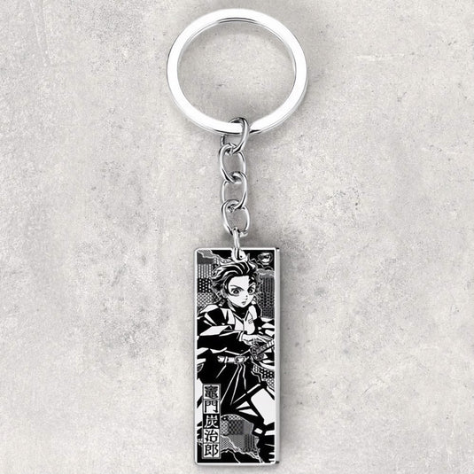 Porte-Clés Tanjiro Kamado - Emportez la détermination de Tanjiro partout avec vous grâce à ce porte-clés en acier inoxydable, un accessoire essentiel pour les fans de Demon Slayer