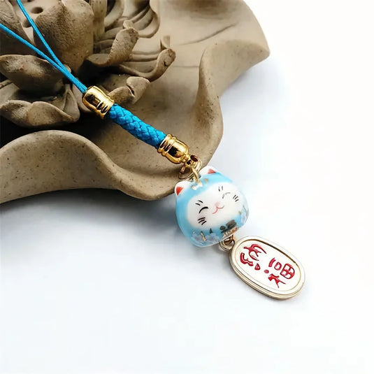 Sangle de téléphone japonaise bleue avec chat porte-bonheur Maneki Neko