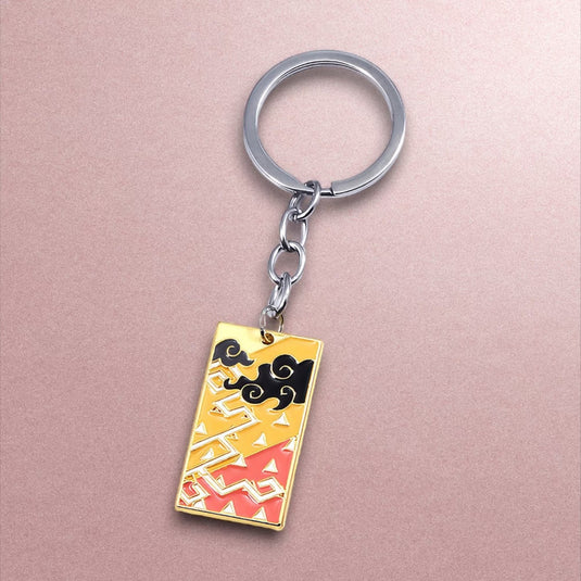 Porte-clés Demon Slayer Zenitsu - Personnalisez votre trousseau de clés avec ce porte-clés en métal aux couleurs éclatantes, un produit japonais qui rend hommage à l'un des personnages préférés de la série